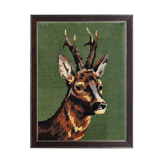 Needlework deer reproduction on a green background